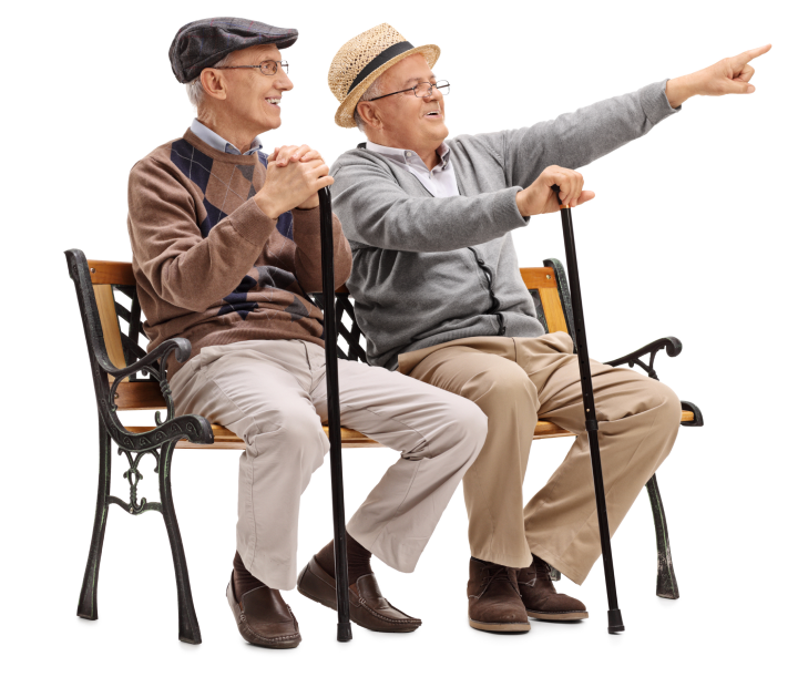 Senior citizens talking on a bench