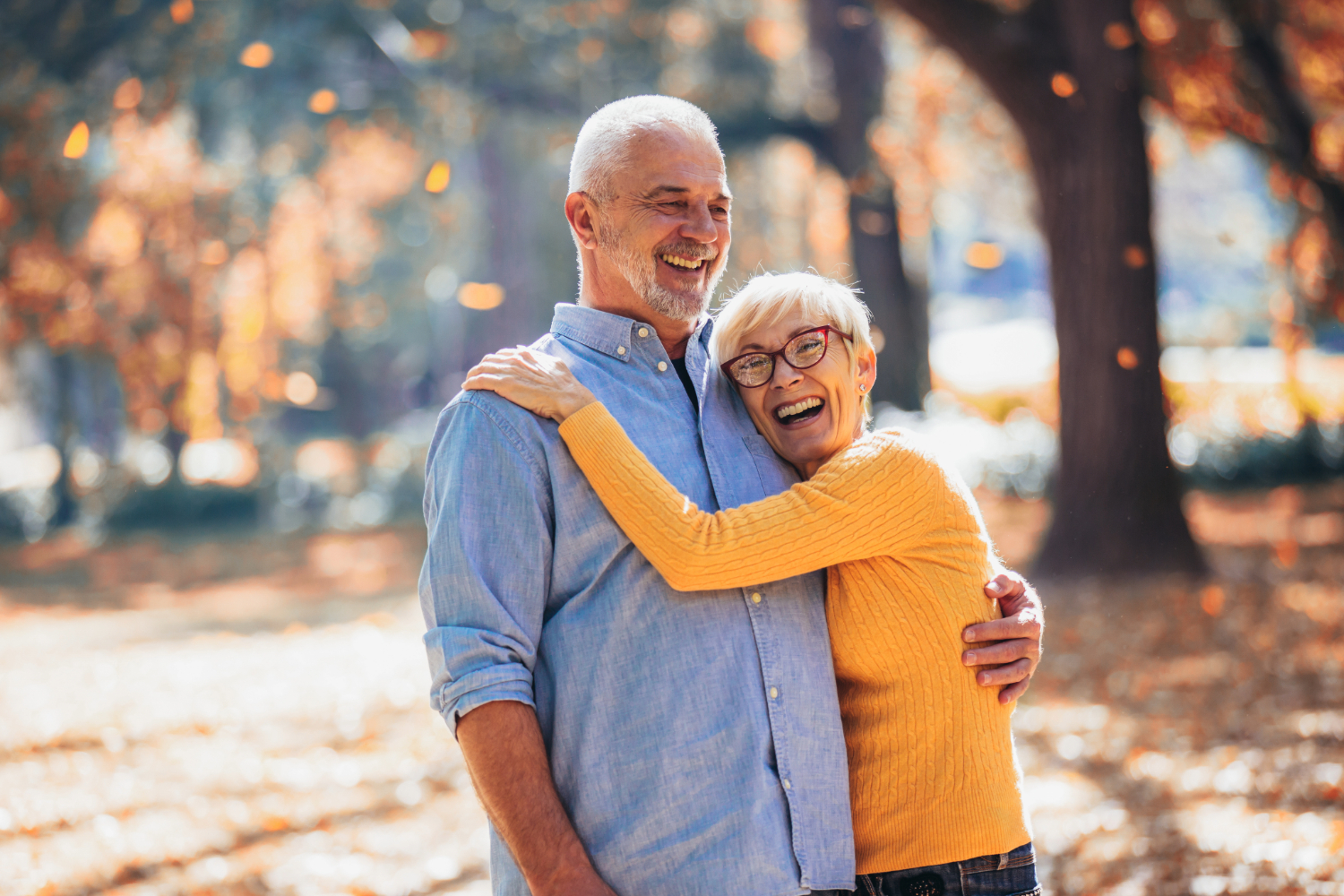 Happy old couple hugging